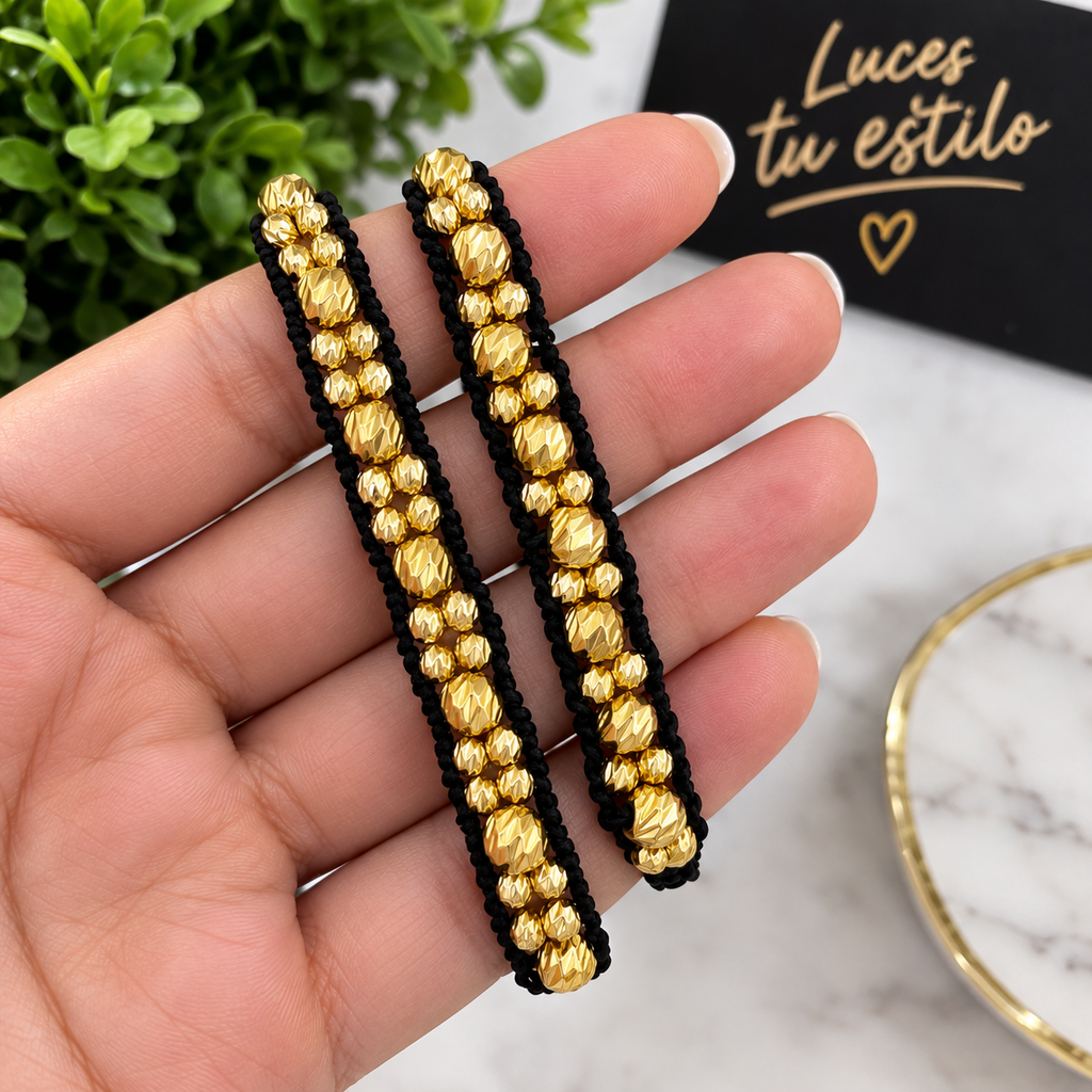 Dúo Pulseras Negro y Oro · 3 Carriles