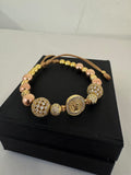 Pulsera San Benito Oro Rosa + Bola de Fuego