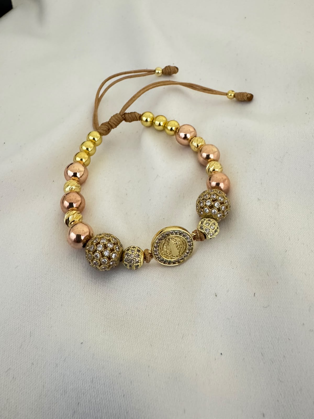 Pulsera San Benito Oro Rosa + Bola de Fuego